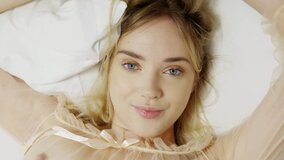 Blonde beauty wakes up horny and fingers herself raw