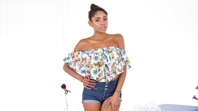 Petite Latina spreads wide and fingers on massage table