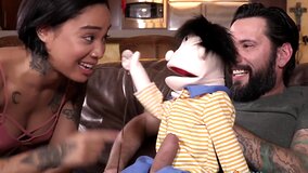 Petite Asian babe rides bearded puppet master stud