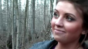 Sexy bitch is sucking two dicks in the forest in a hot threesome
