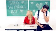 A blonde with large tits is fucked in the classroom hard