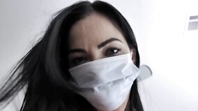 Dark-haired girl wears mask and gloves during sex with stepbro