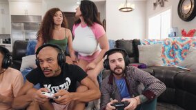 PLaying video games leads to a wild group sex session