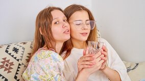These lovely teens with tight pussies are madly in love