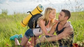 Handsome blonde with great boobs having fun in the field