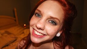 Petite ginger babe smiles while sucking ex big black cock
